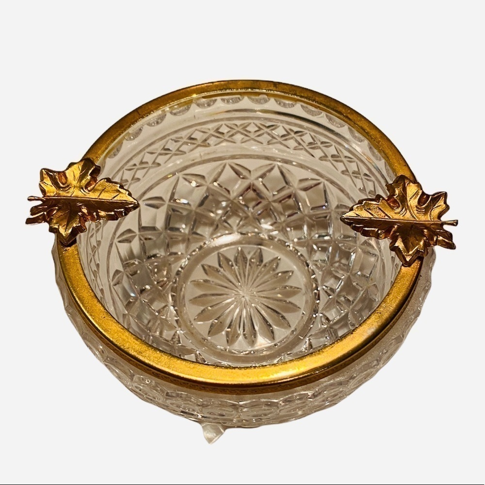 Crystal Candy Dish/Trinket Bowl with gilt metal frame adorned with vine leaves.
